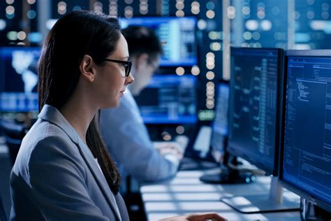 Cybersecurity expert working on a computer