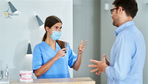 Dental assistant and patient