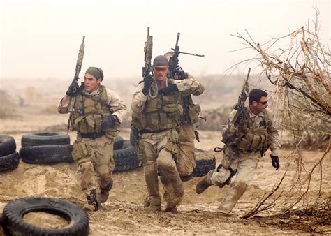 Soldiers training in a desert environment at Fort Irwin