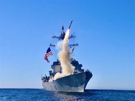 Destroyer ship launching missiles