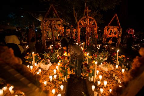 A traditional Día de Muertos celebration with sugar skulls and other decorations