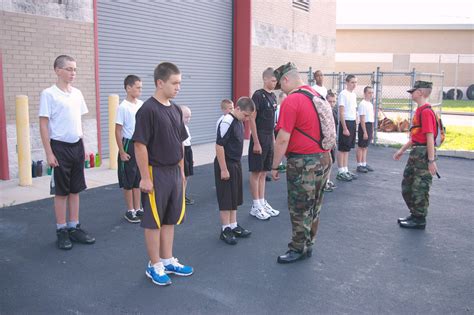 Adults participating in team-building activities at discipline camp