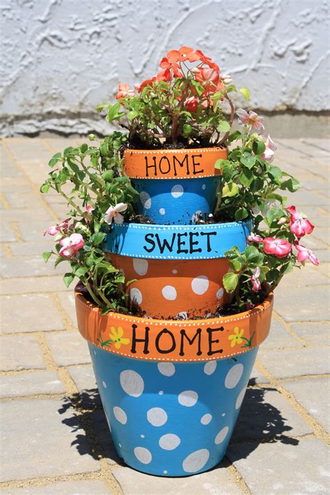 DIY flower pot designs with nature-inspired patterns and colors