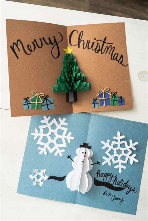 DIY pop-up Christmas card with snowflakes and trees