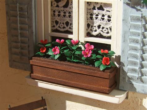 Dollhouse windows with flowers