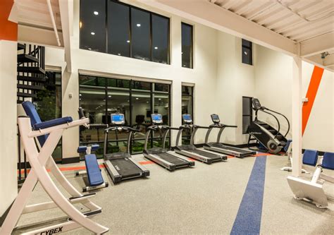 A well-equipped dorm fitness center with modern exercise equipment