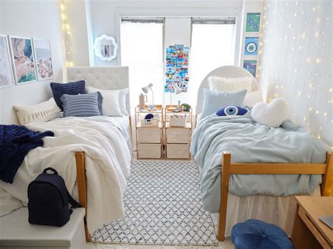 A cozy dorm room with a comfortable bed and desk