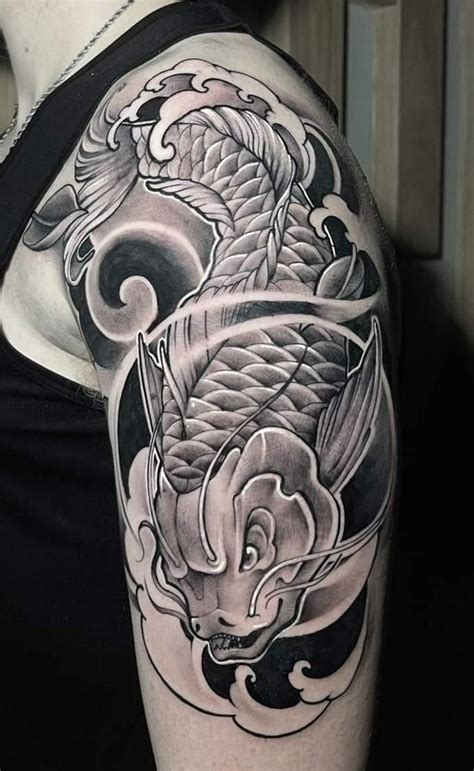 A colorful dragon koi tattoo on the back