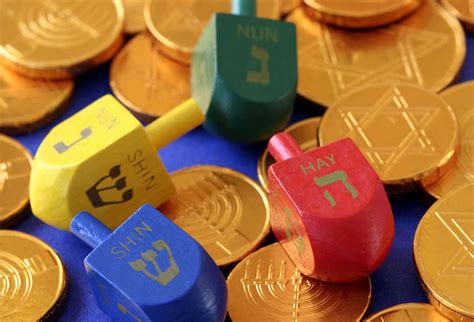 A pot and coins for the dreidel game