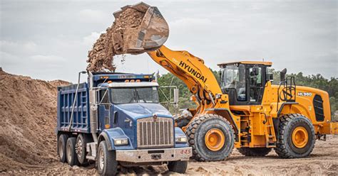 A dump truck hauling materials on a construction site