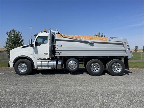 A dump truck hauling materials on a construction site