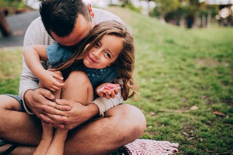 Father playing with his young daughter