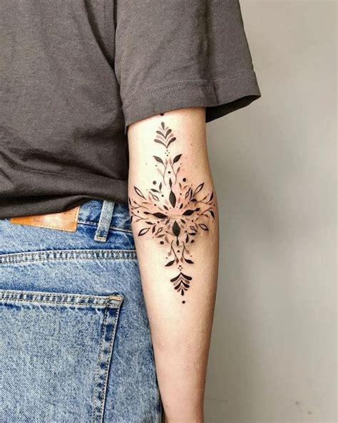 Elbow Tattoo Designs for Females with Flowers