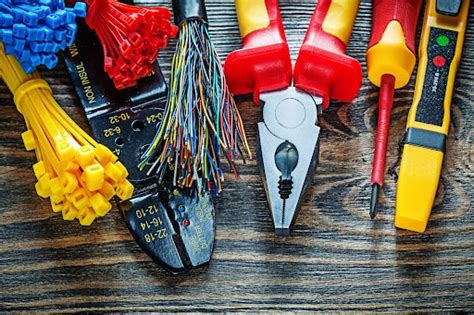 Electrician using specialized tools