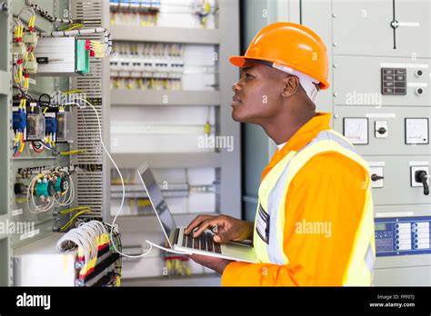 Electricians working in a power plant