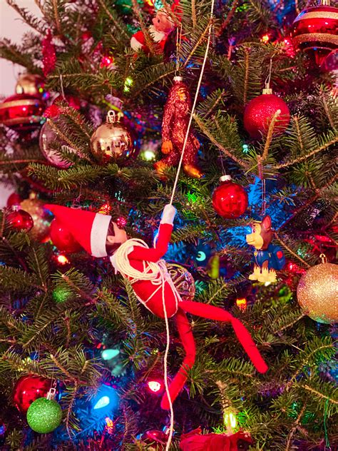 Elf on the Shelf Decorating the Christmas Tree