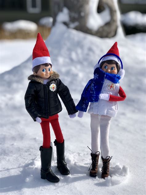 Elf on the Shelf Playing with Snowflakes