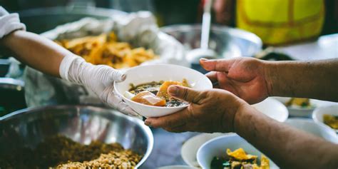 A person receiving emergency food assistance