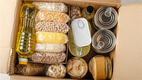 A person holding a emergency food supply kit