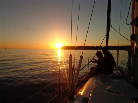 Engineer on a boat enjoying the sunrise