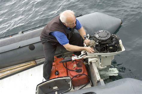 Engineer on a boat working on a machine