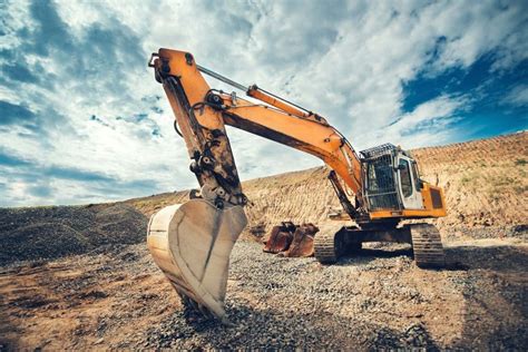 Excavator operator at work