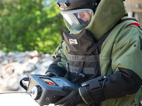 A Marine with his explosive detection dog