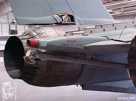 F-14 Tomcat landing on an aircraft carrier with arresting hook