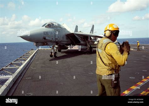 F-14 Tomcat on the lower deck of an aircraft carrier