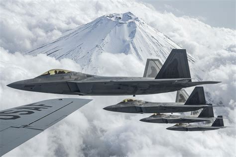 F-22 Raptor Formation Flight at Night