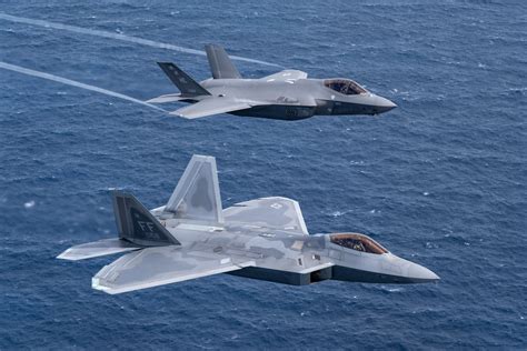 F-22 Raptor and F-35 Lightning II in flight