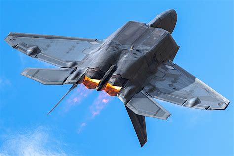 F-22 Raptor performing a steep climb