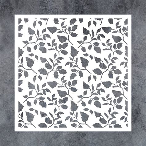 A fabric design featuring leaf stencils