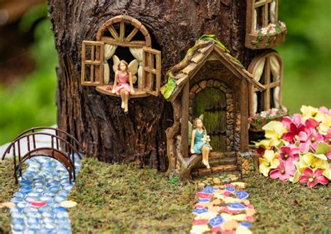 A picture of a fairy garden with hidden flowers and fairies