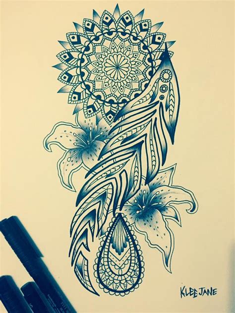 Feather mandala tattoo on the back