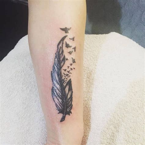 Feather tattoo gallery and designs