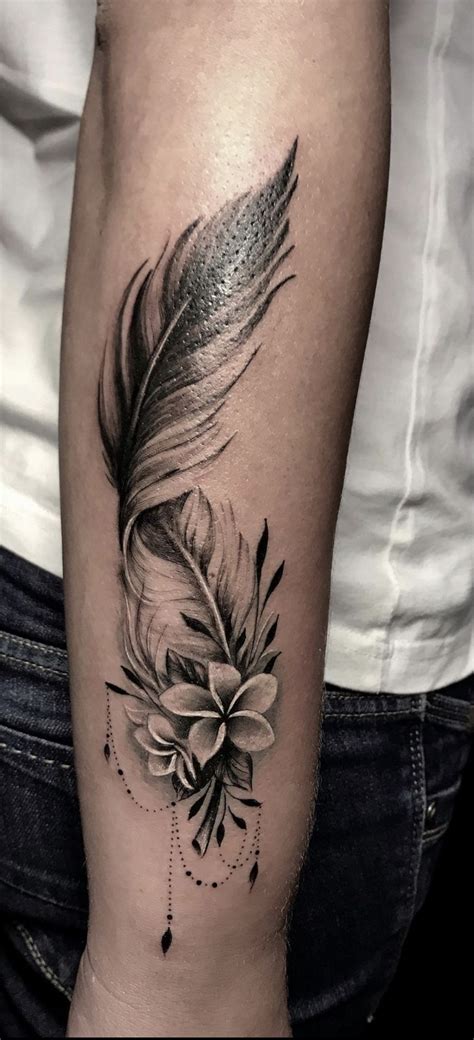 Feather tattoo ideas for arm