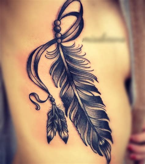 Feather tattoo ideas for back