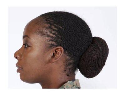 Female Marine wearing her hair in braids