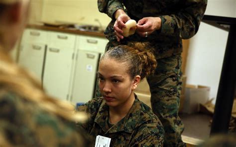 Female Marine wearing her hair in a ponytail