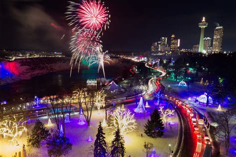 A festive holiday season at Niagara Falls, featuring lights, decorations, and snow