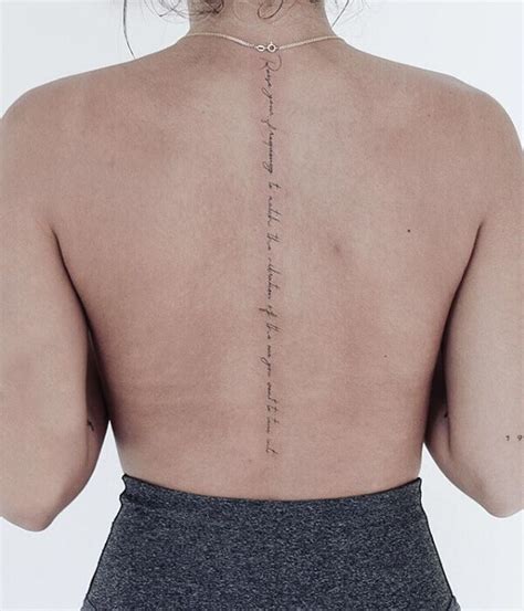 Fine line tattoos on the back