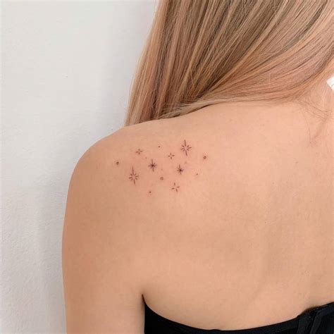 Fine line tattoos on the shoulder