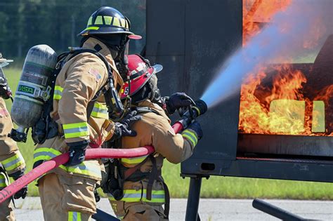 Firefighters training with equipment