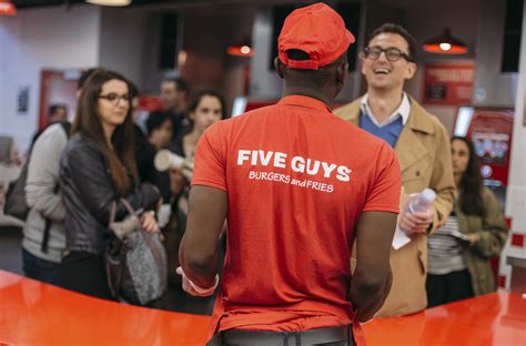 Five Guys Crew Member Working