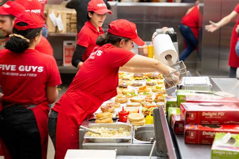 Five Guys Crew Member Working