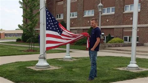 Flag being held above the ground