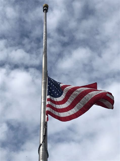 Flags being lowered to half-mast