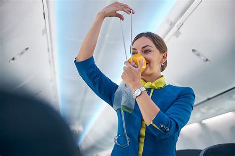 Flight attendants maintaining the cabin