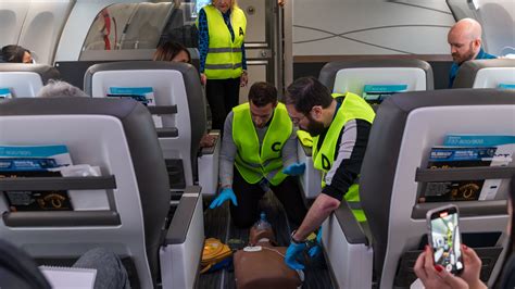 Flight attendants undergoing emergency training